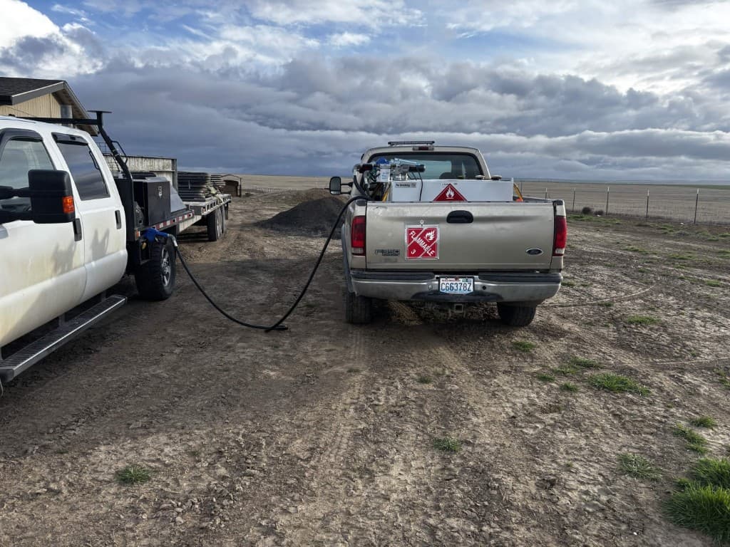 Rapid Refuel truck fueling a vehicle on a farm